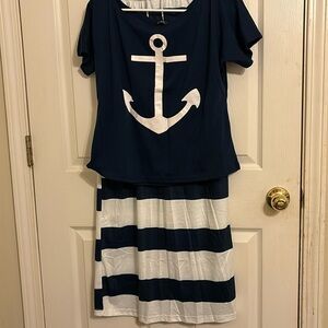 BRAND NEW . Never worn. Long skirt and off the shoulder anchor blouse !